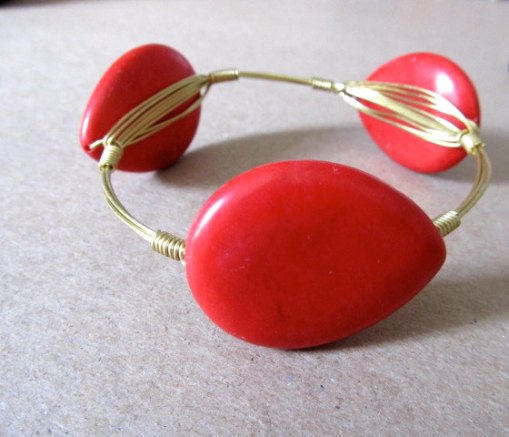 Red HOT and gold bangle from Roc Me Out Online Boutique